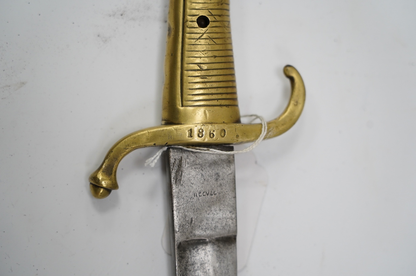 A composite short sword, British military blade by Reeves with Continental brass hilt, blade 66.5cm. Condition - fair